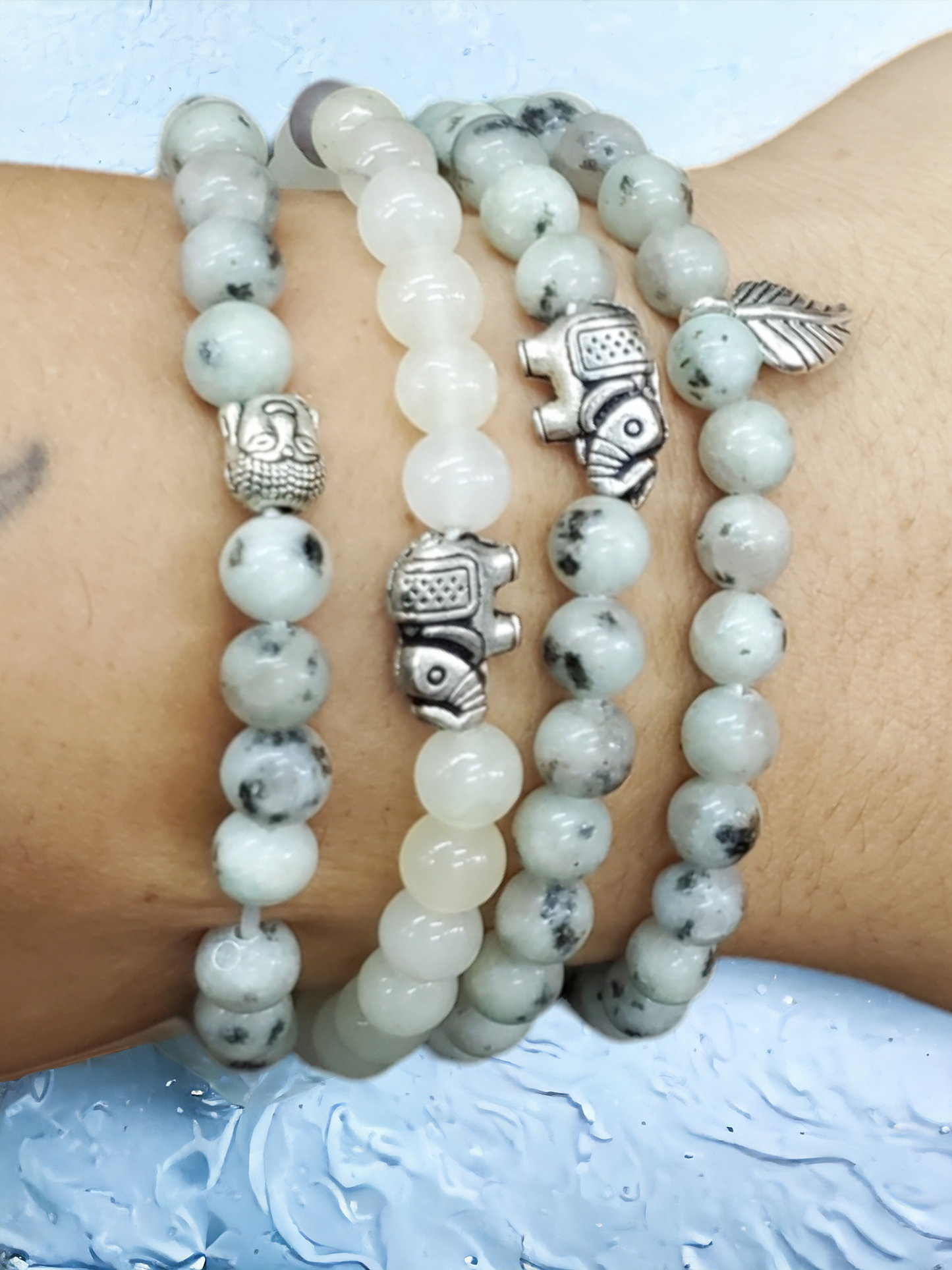 4 MOONSTONE bracelets with cute amulets